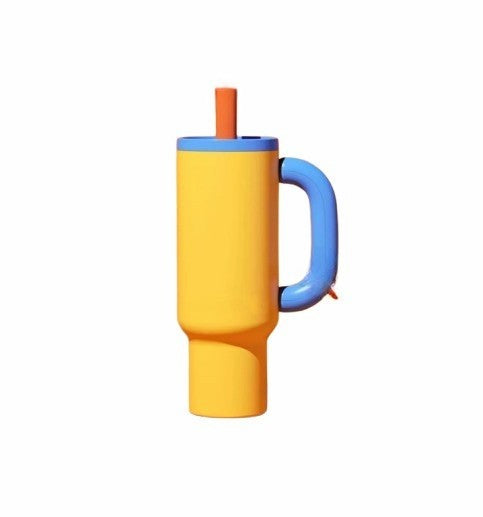 Tasse isotherme jaune avec couvercle bleu, poignée assortie et paille réutilisable intégrée