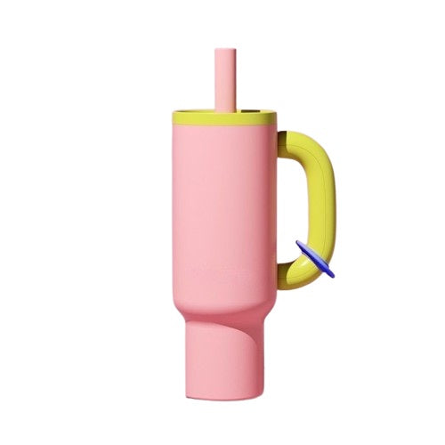 Tasse isotherme rose avec couvercle jaune, poignée assortie et paille réutilisable intégrée